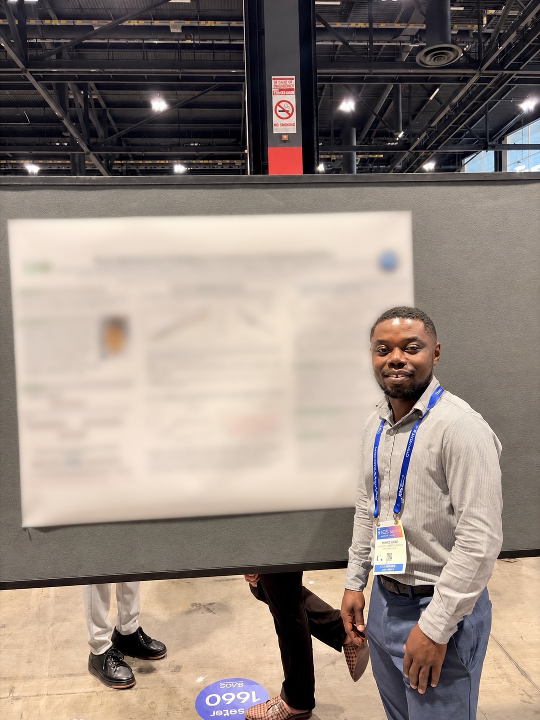 Prince presenting his poster at the ACS Fall meeting in Chicago